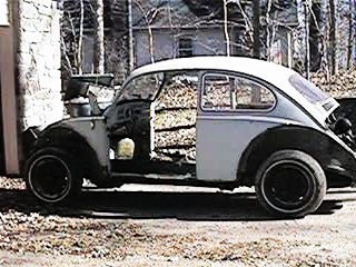 Car-Stripped-In-Driveway-2.JPG (48915 bytes)
